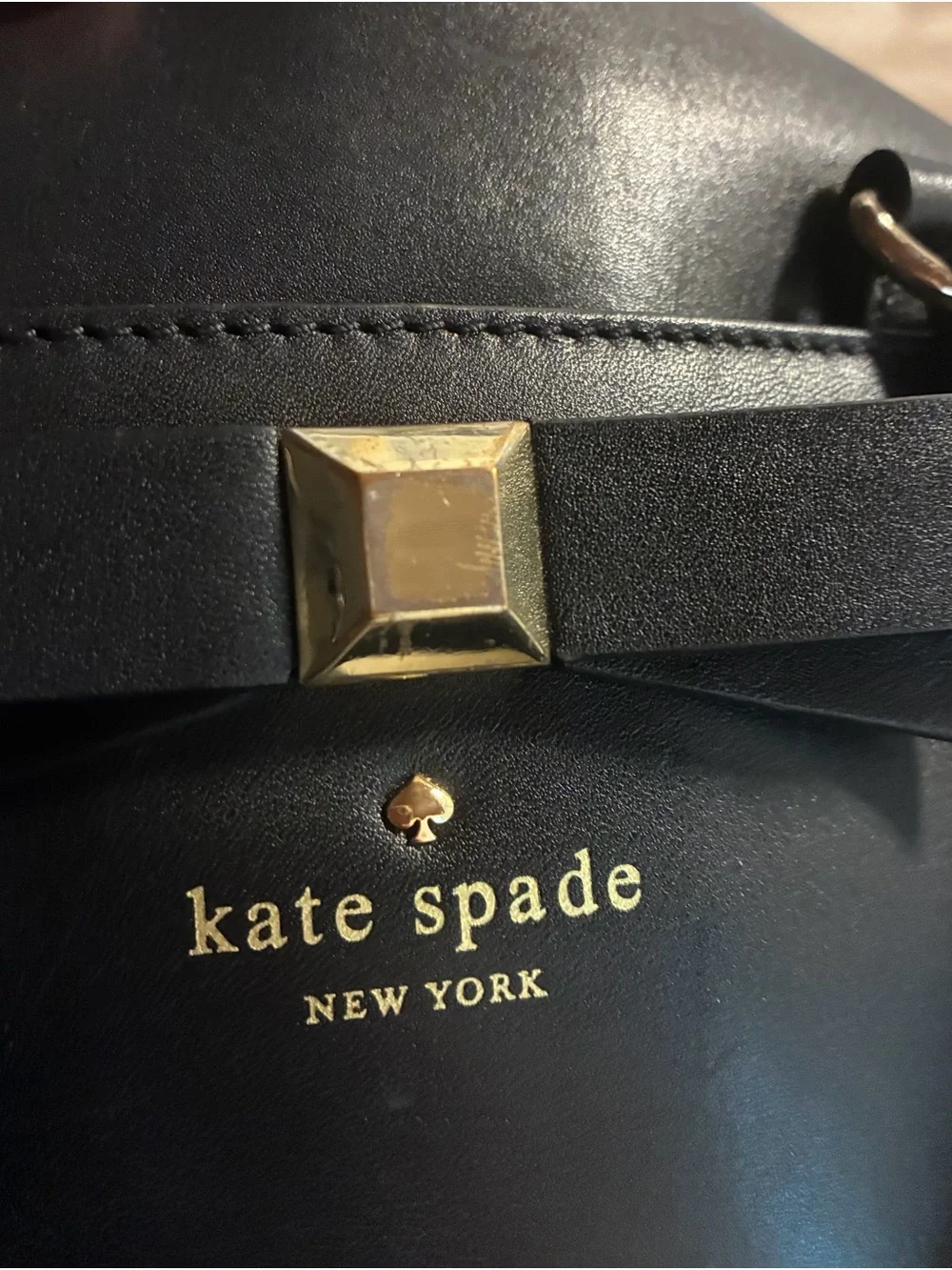 kate spade black leather satchel with bow and gold hardware